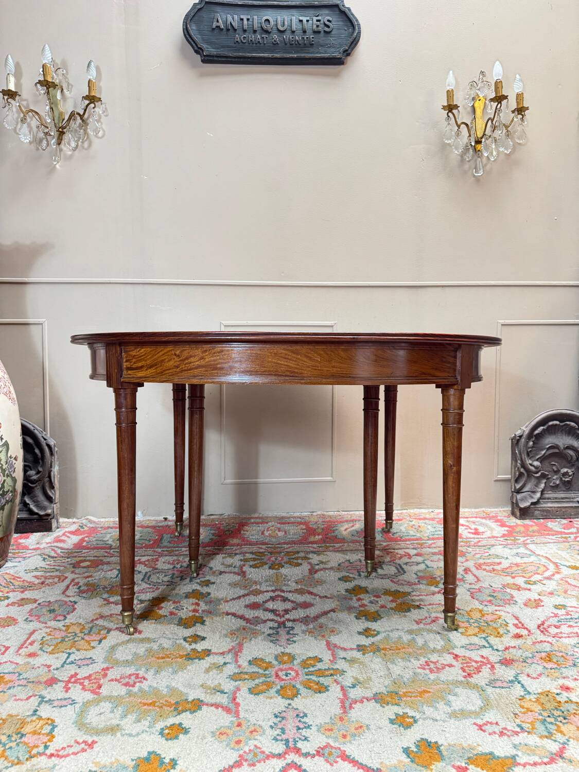 Dining table with a mahogany band in louis xvi style