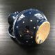 Midnight blue pitcher décor white polka dots