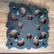 Old dish bottoms in black cast iron