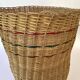 High basket with woven straws