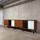 Enfilade buffet display cabinet in vintage 1950s style.
