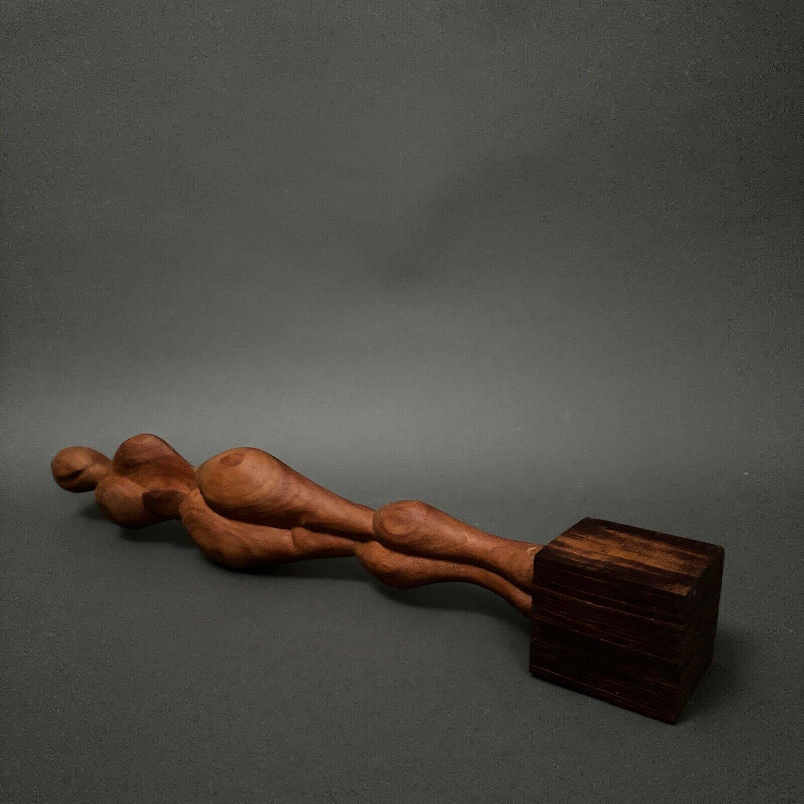 Carved wooden sculpture of a woman by Calin Hentea, 20th century
