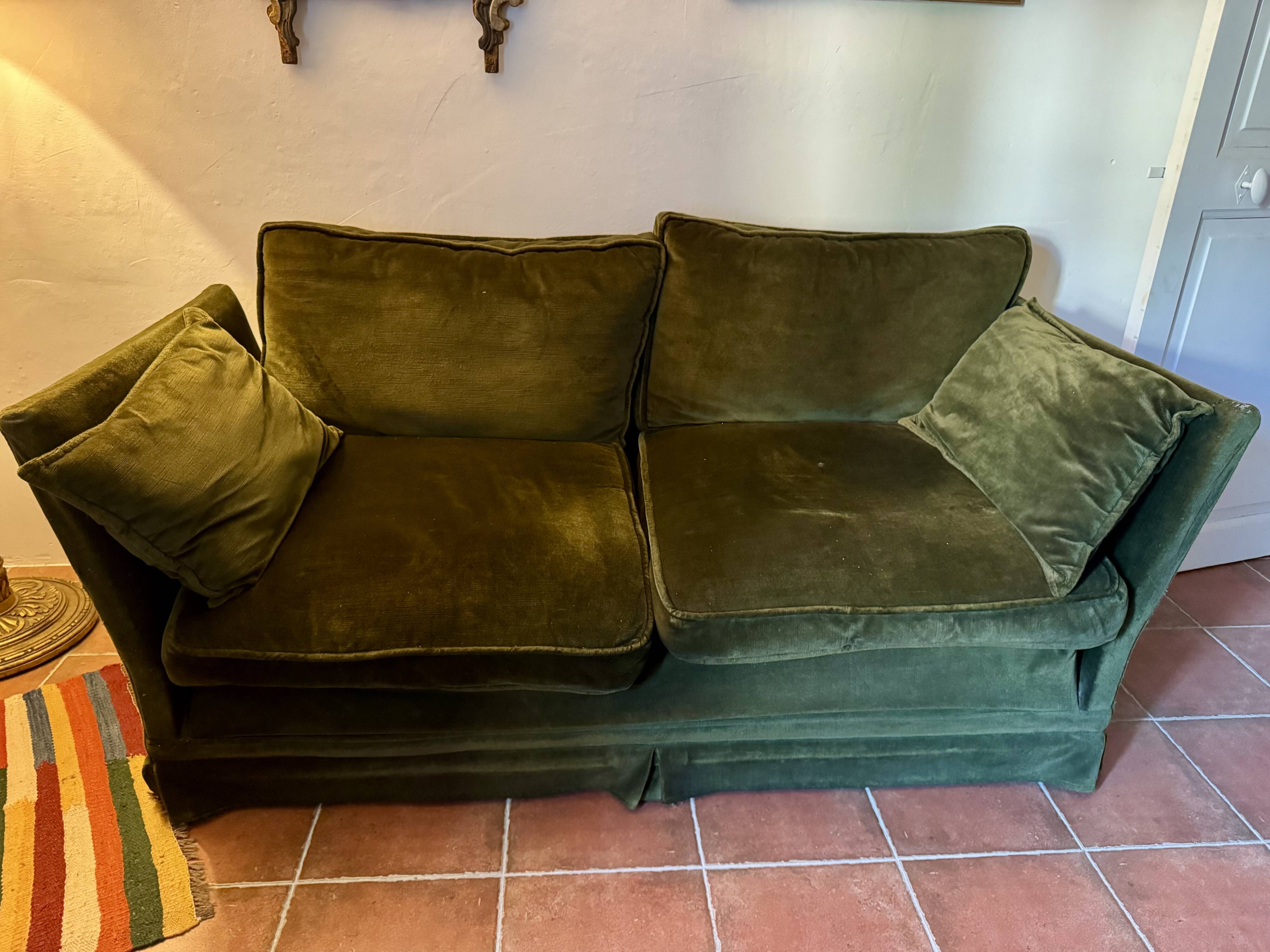 Antique green velvet sofa