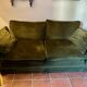 Antique green velvet sofa