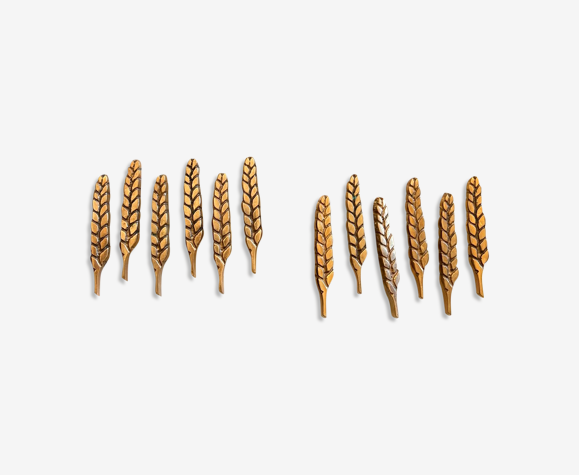 12 porte-couteaux en bronze