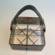 Leather, brass and gold metal bottle holder