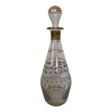 Antique golden carafe with colorful patterns
