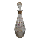 Carafe ancienne dorée à motifs colorés
