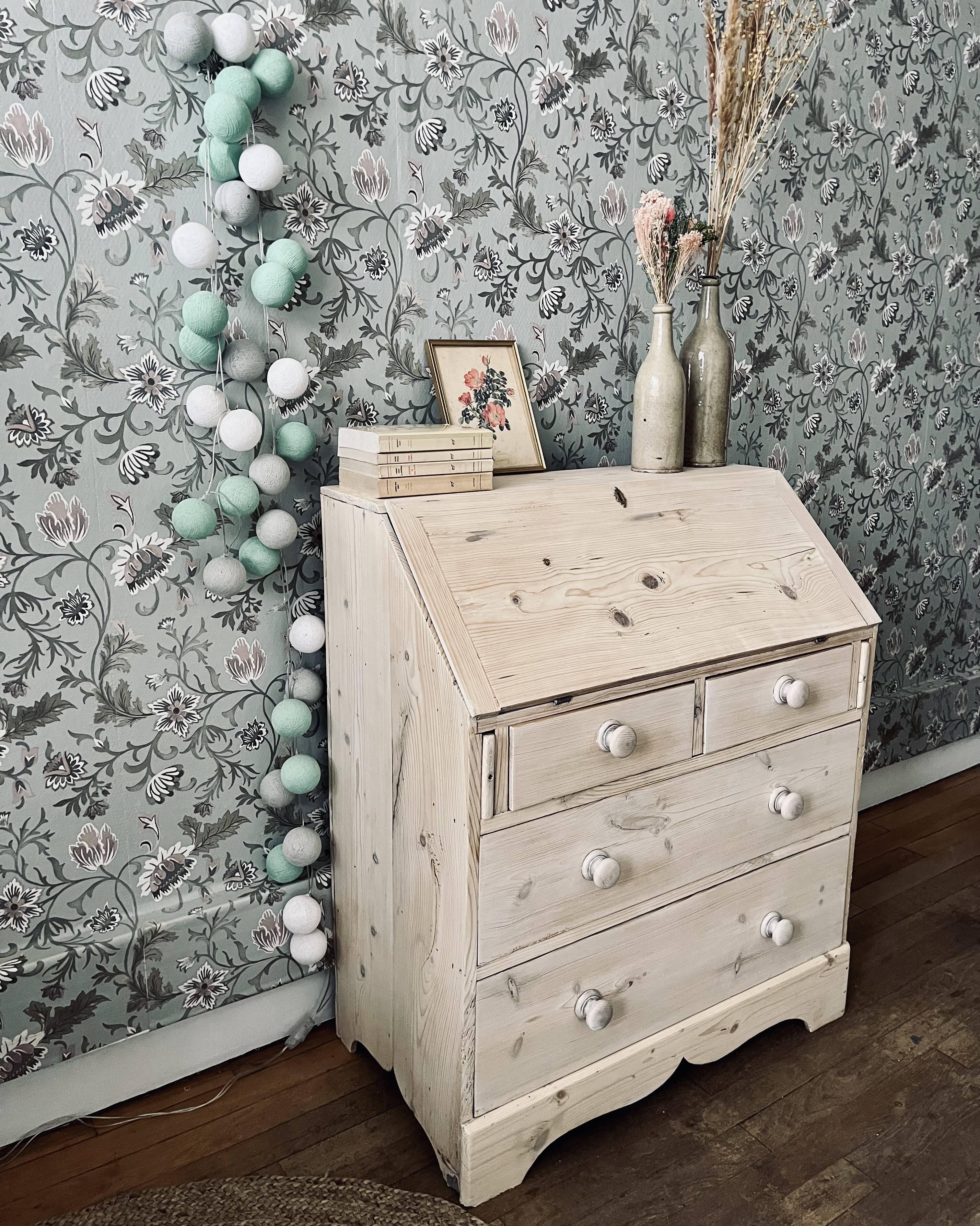 English chest of drawers topped with a sloping secretary