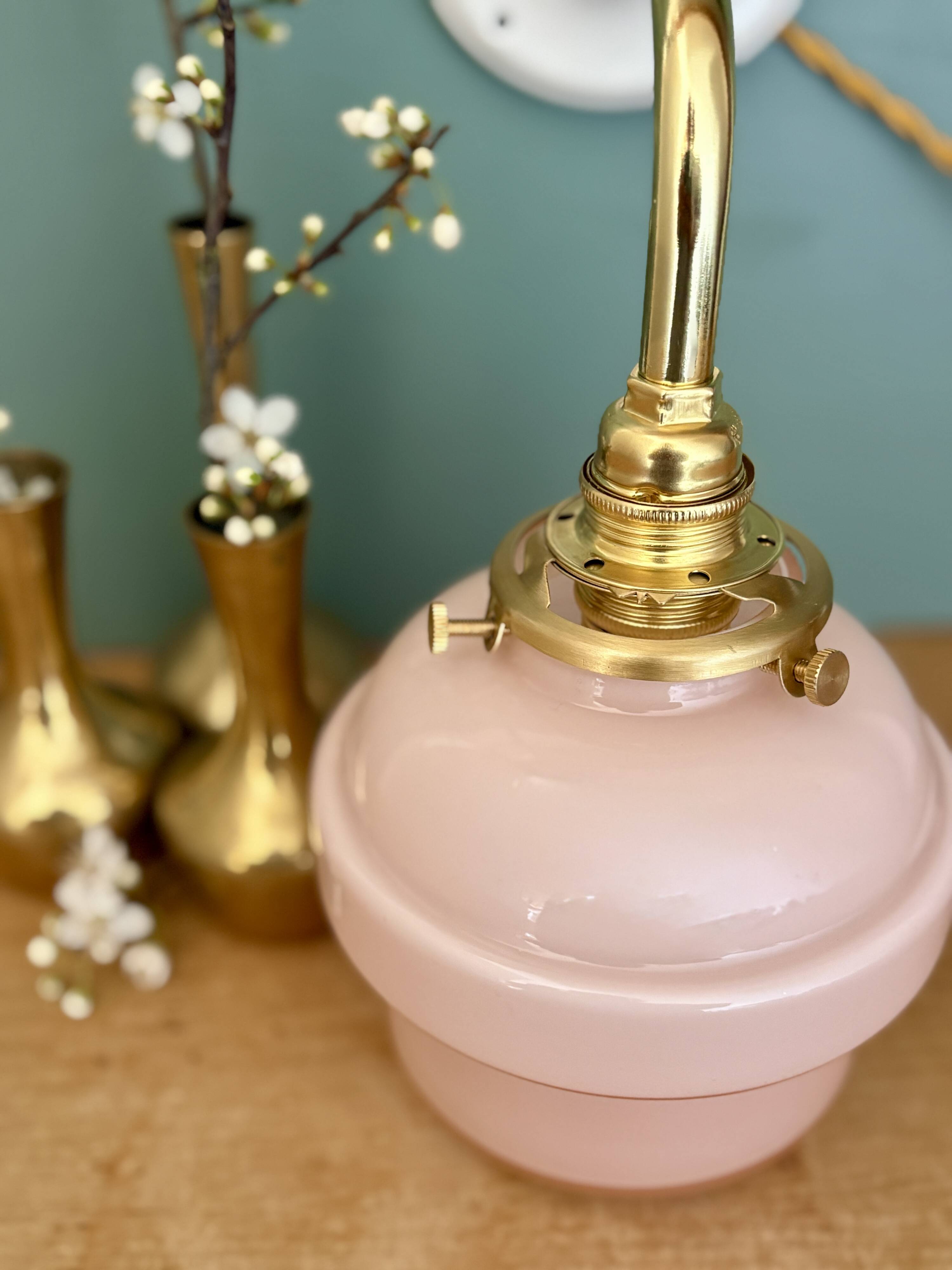 Vintage pink opaline globe wall light.