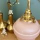 Vintage pink opaline globe wall light.