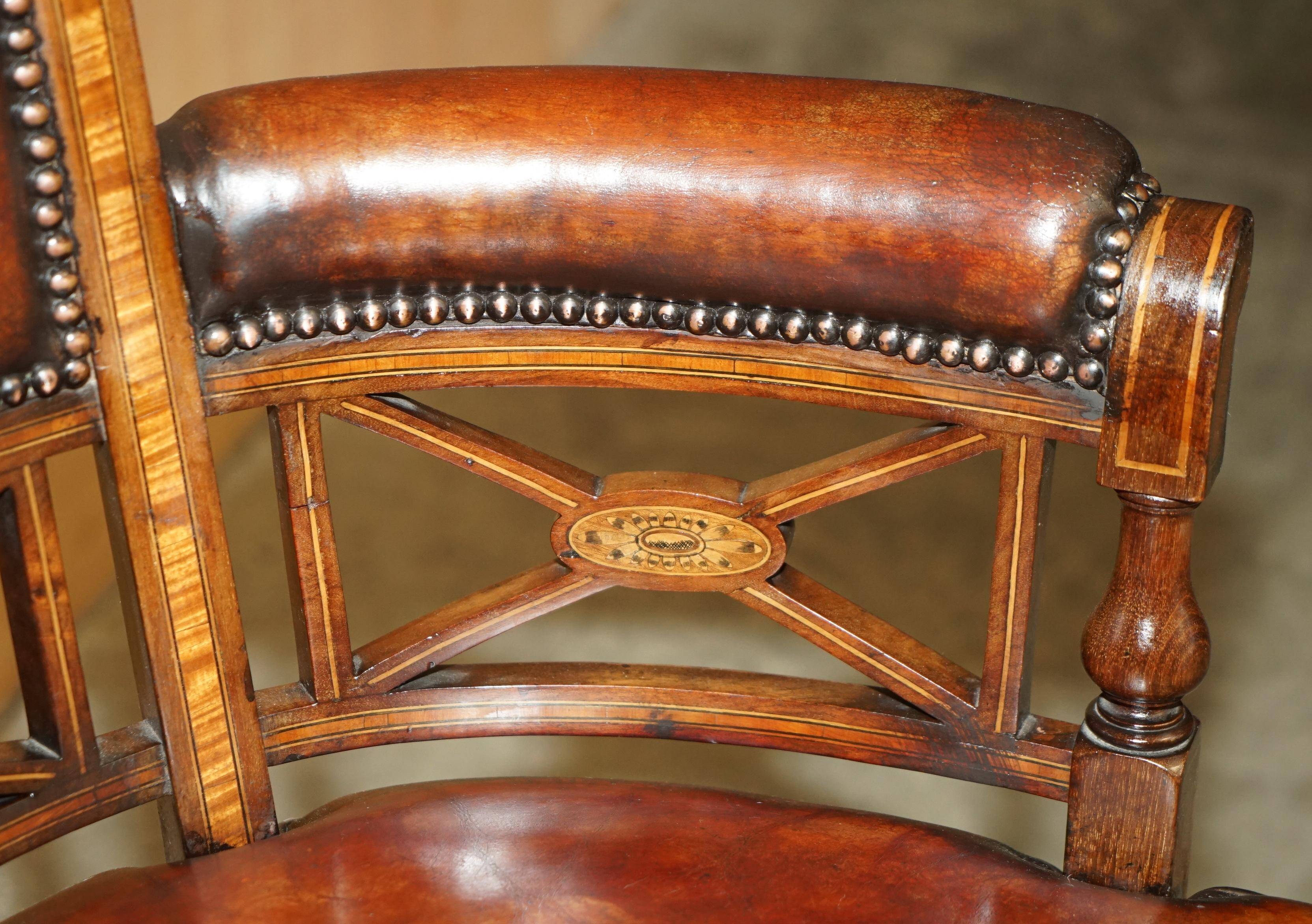 Victorian captain's chair in leather restored by Cornelius V Smith.