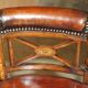 Victorian captain's chair in leather restored by Cornelius V Smith.