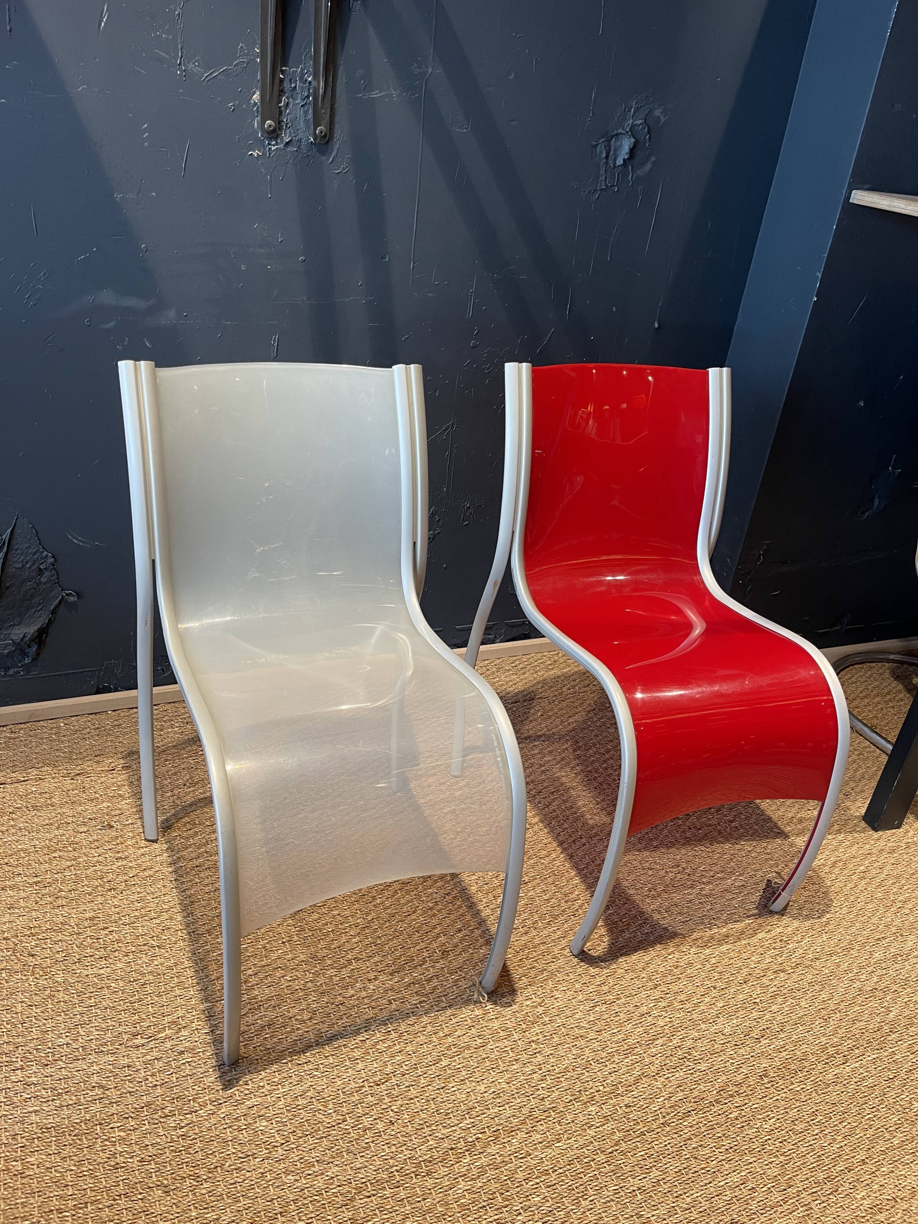 Pair of FPE chairs by Ron Arad for Kartell translucent and red Italy