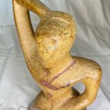 Wooden woman sculpture
