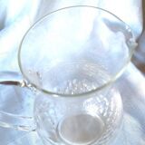 Crystal pitcher engraved with petals