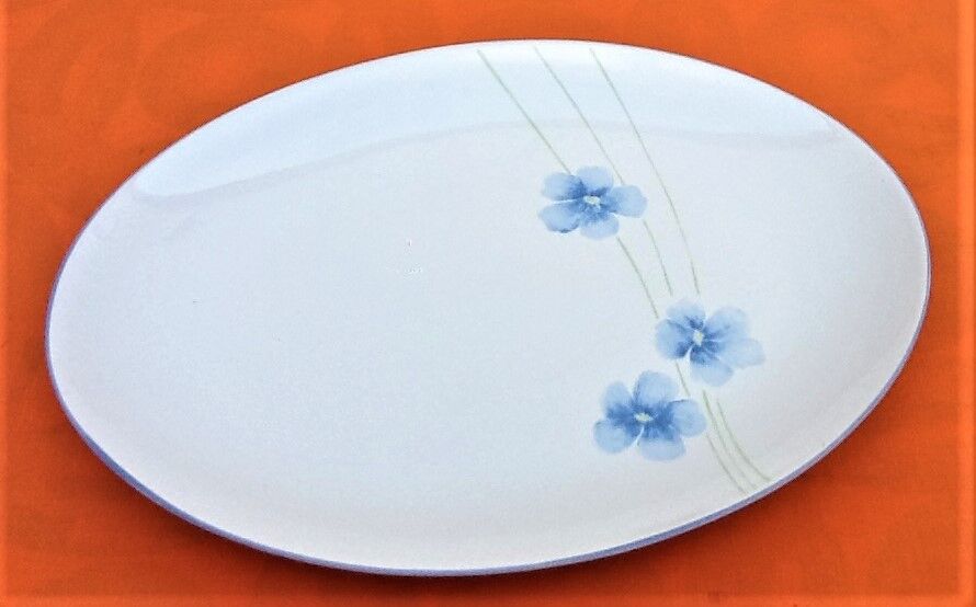 Serving dish by Eléonore Baillet Oval shape Porcelain with floral decoration