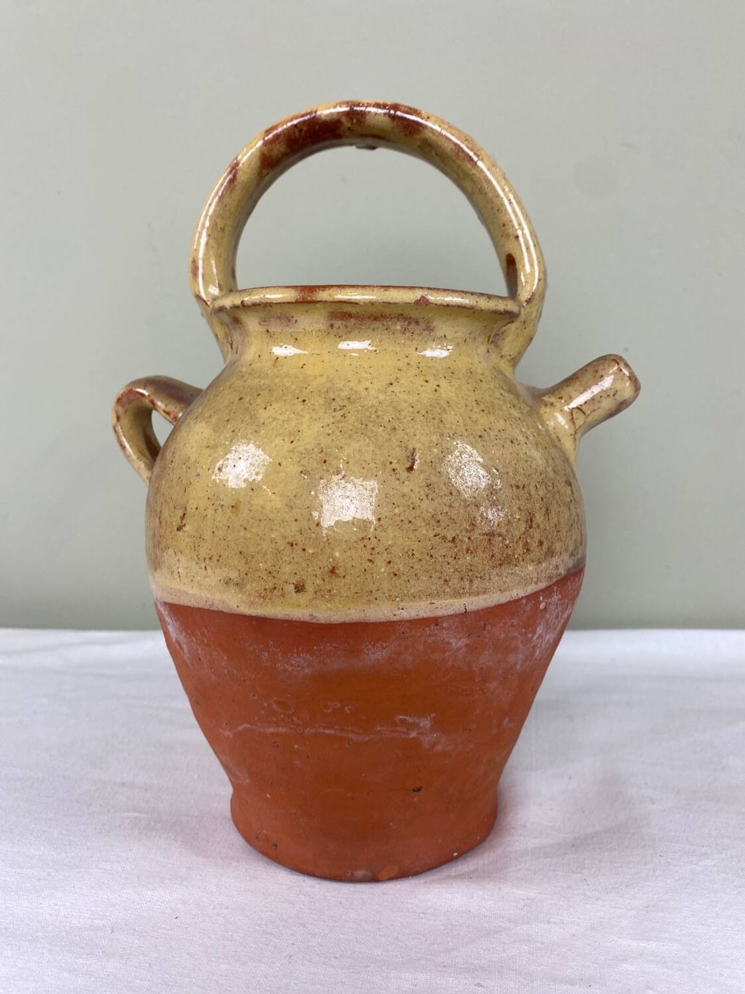 Glazed terracotta jug