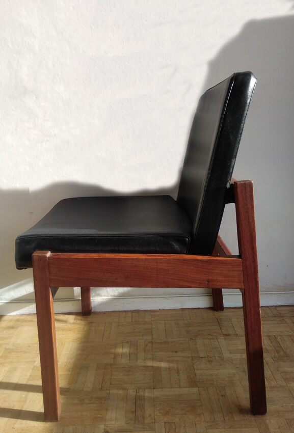 Massive teak and black skai armchair from the 1960s