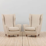 Pair of Italian wingback lounge chairs reupholstered