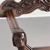 Vintage carved wooden folding armchair