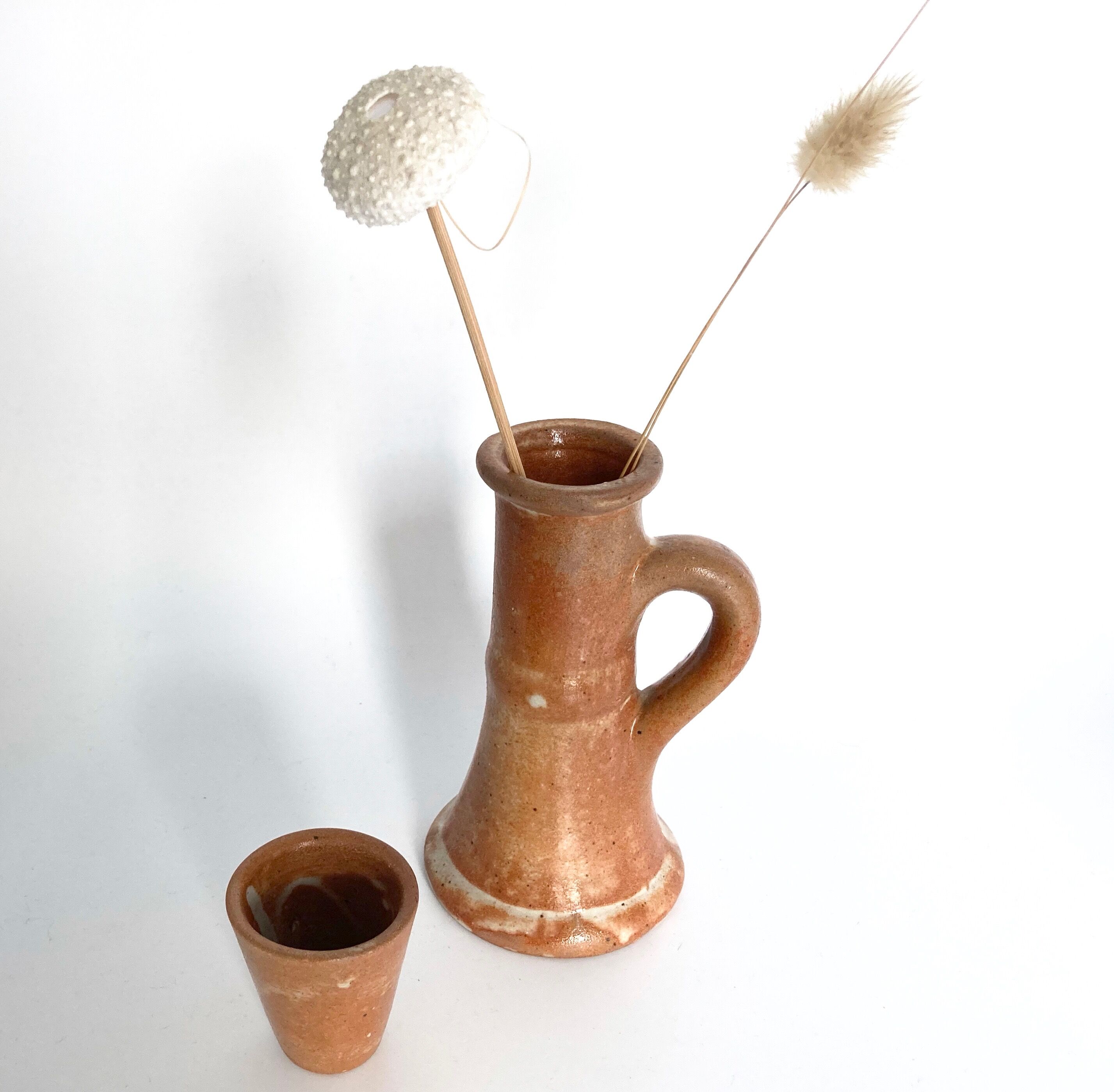 Bougeoir et vase en grès