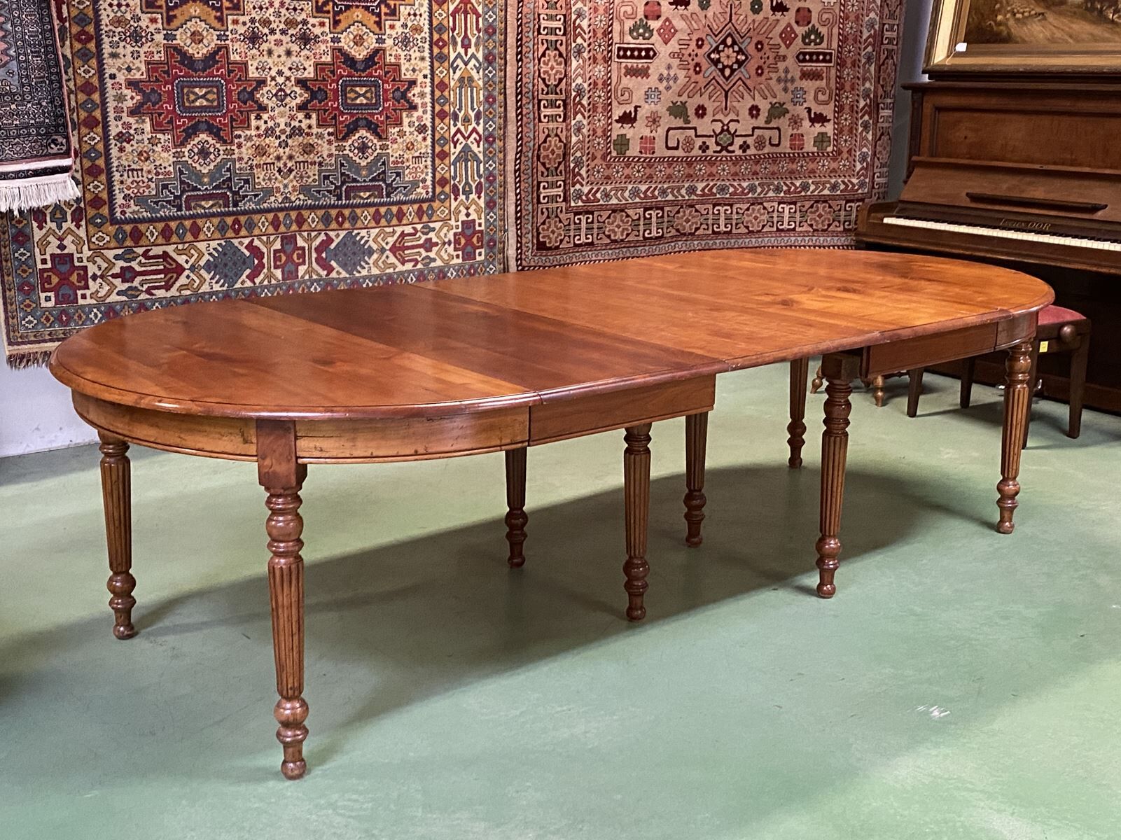 Louis Philippe round table 8 feet in cherry with 6 extensions