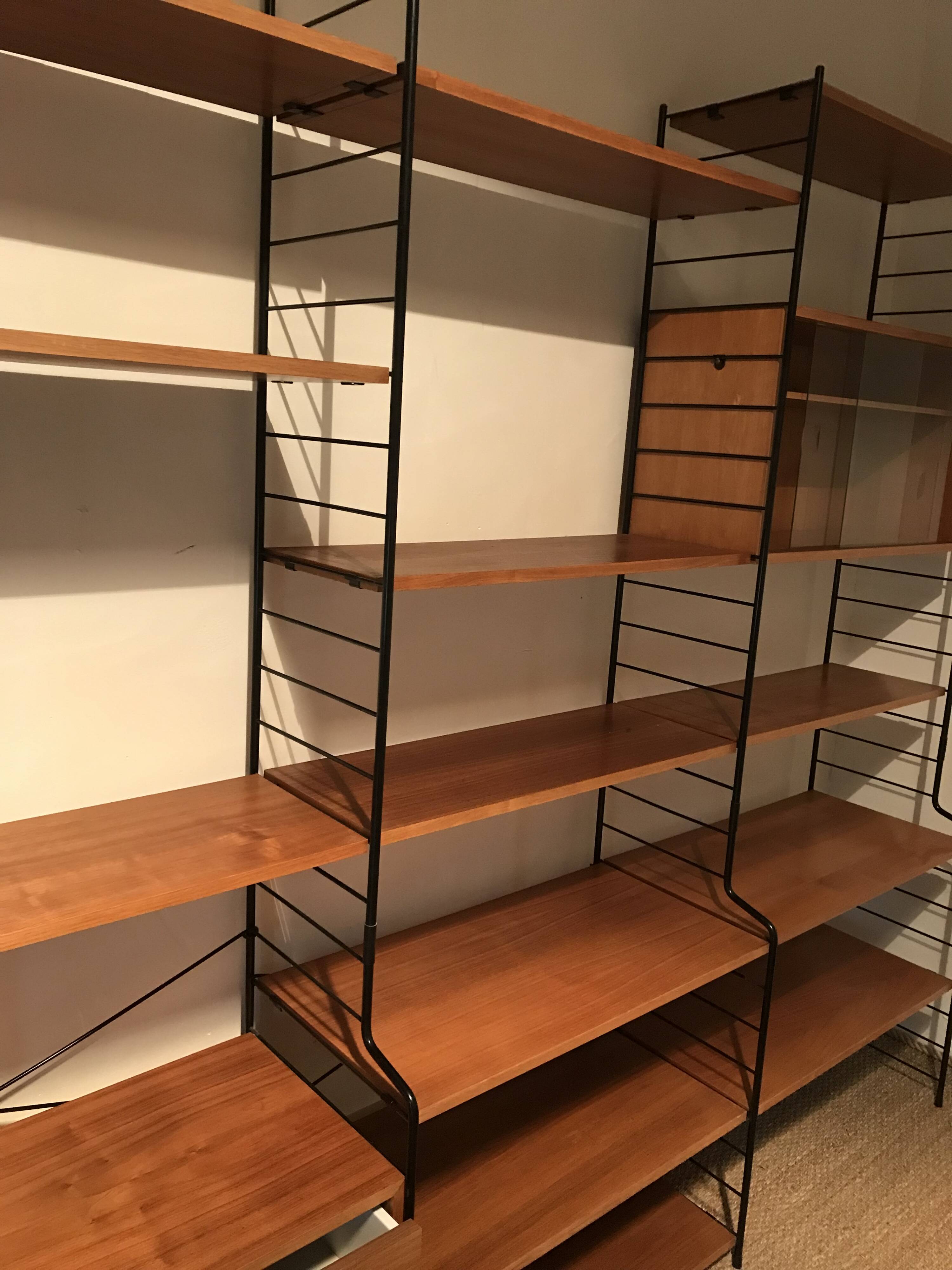 Vintage modular wall-mounted library shelf in blond walnut 1960-80