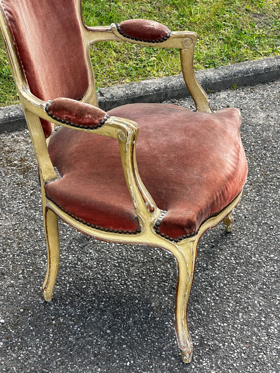 Louis XV cabriolet armchair, patinated wood and antique velvet.