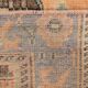 Tapis oriental vintage fait main orange pastel