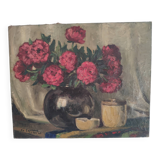 Still life with bouquet of red flowers