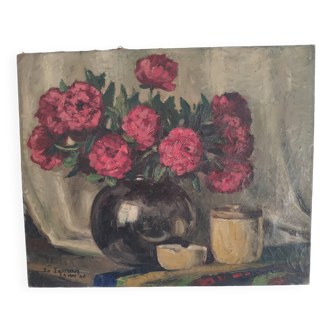 Still life with bouquet of red flowers