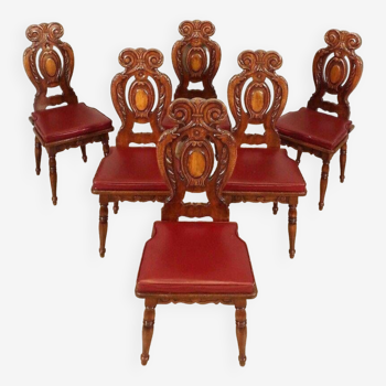 Suite of six fully carved Renaissance style chairs from the late 19th century