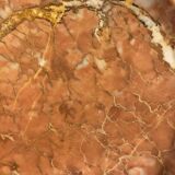 Empty pocket on foot in red marble