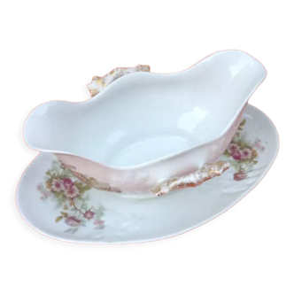 Sauce boat on dormant white porcelain, floral decoration