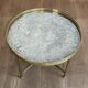 Brass coffee table with a vintage mirror top from the Baguès house.