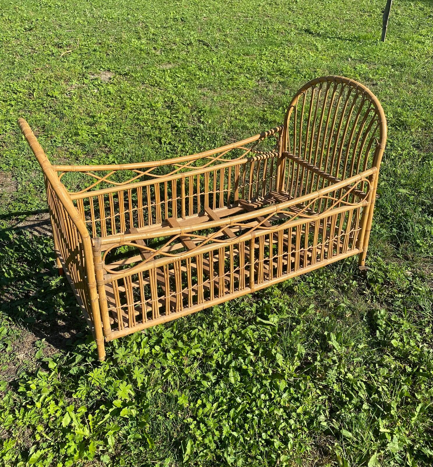 Children's bed in vintage rattan