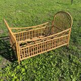 Children's bed in vintage rattan