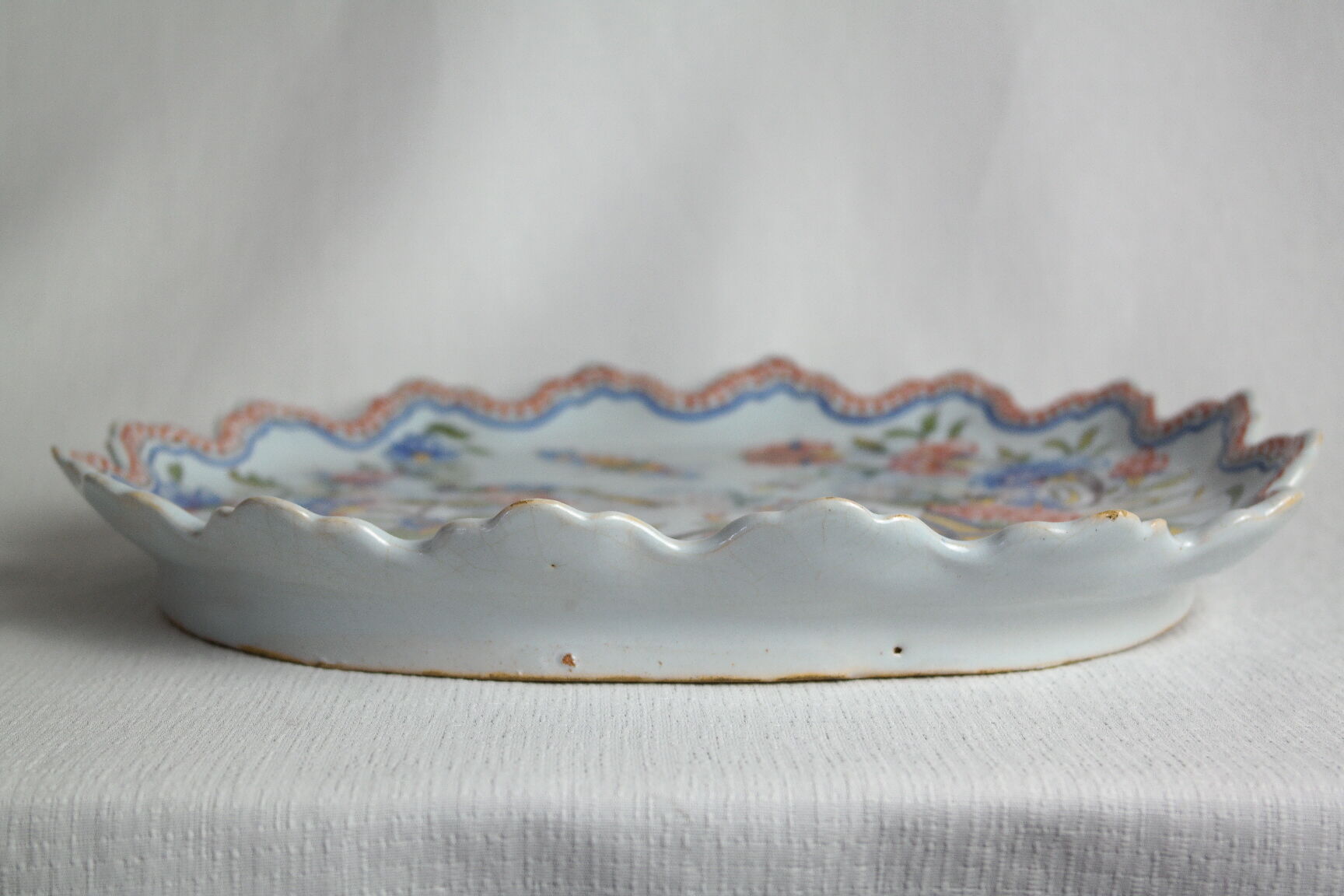 Flat earthenware of Rouen polychrome decoration cornucopia of plenty