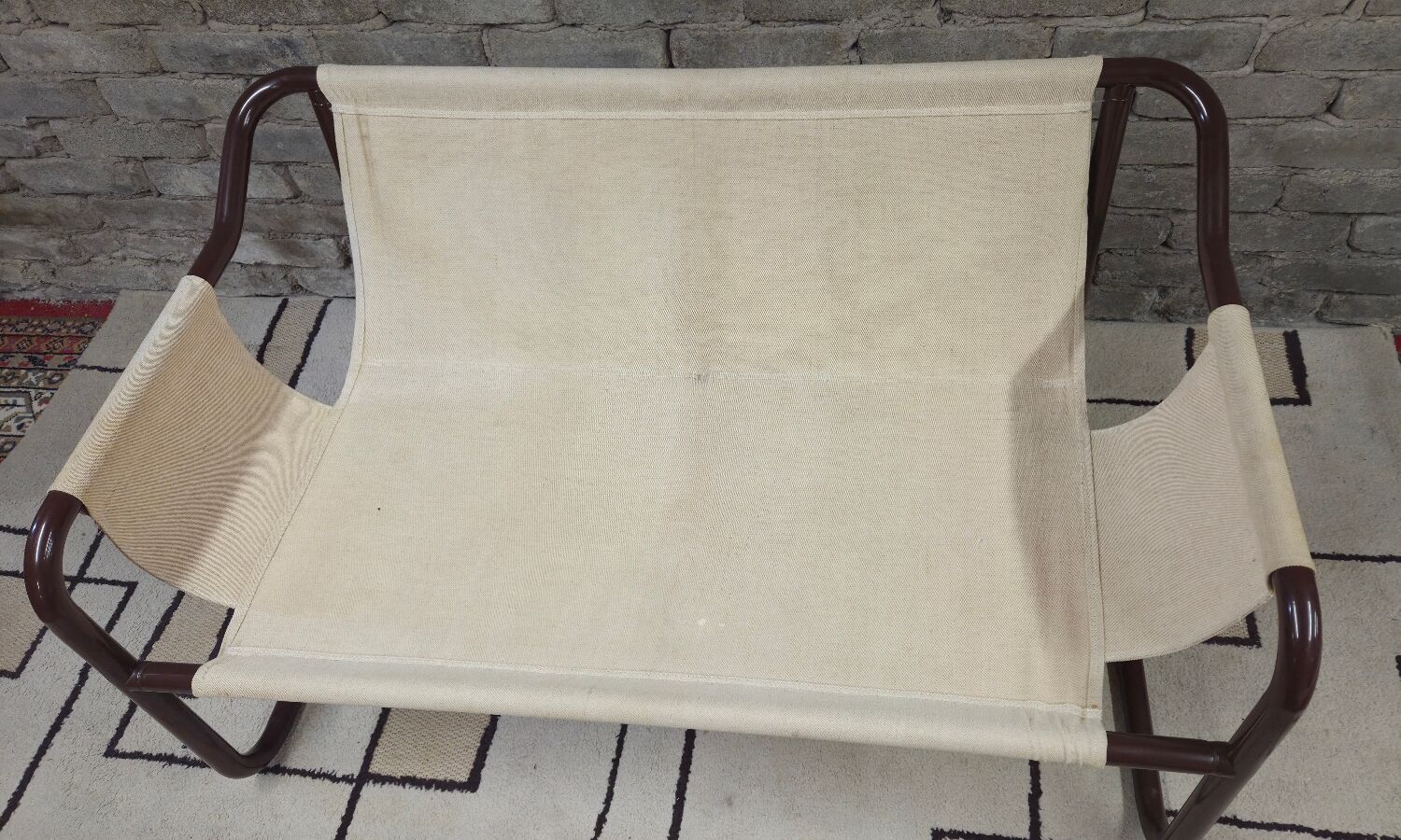 Tubular two-seater bench from the 1970s.