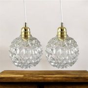 Set of two chiseled glass pendant lights