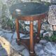 Empire style mahogany and mahogany veneer tripod pedestal table