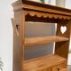 Wall shelf in raw wood with drawers and openwork hearts
