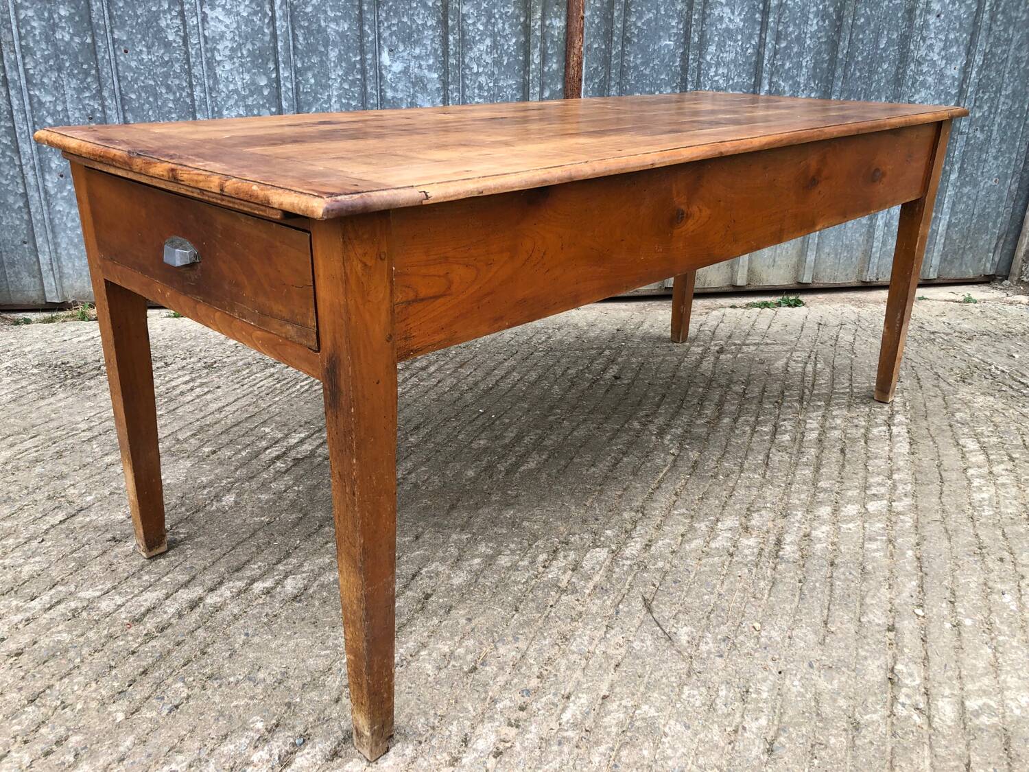 Antique cherry farmhouse table with 2 drawers and 1 pull-out