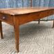 Antique cherry farmhouse table with 2 drawers and 1 pull-out