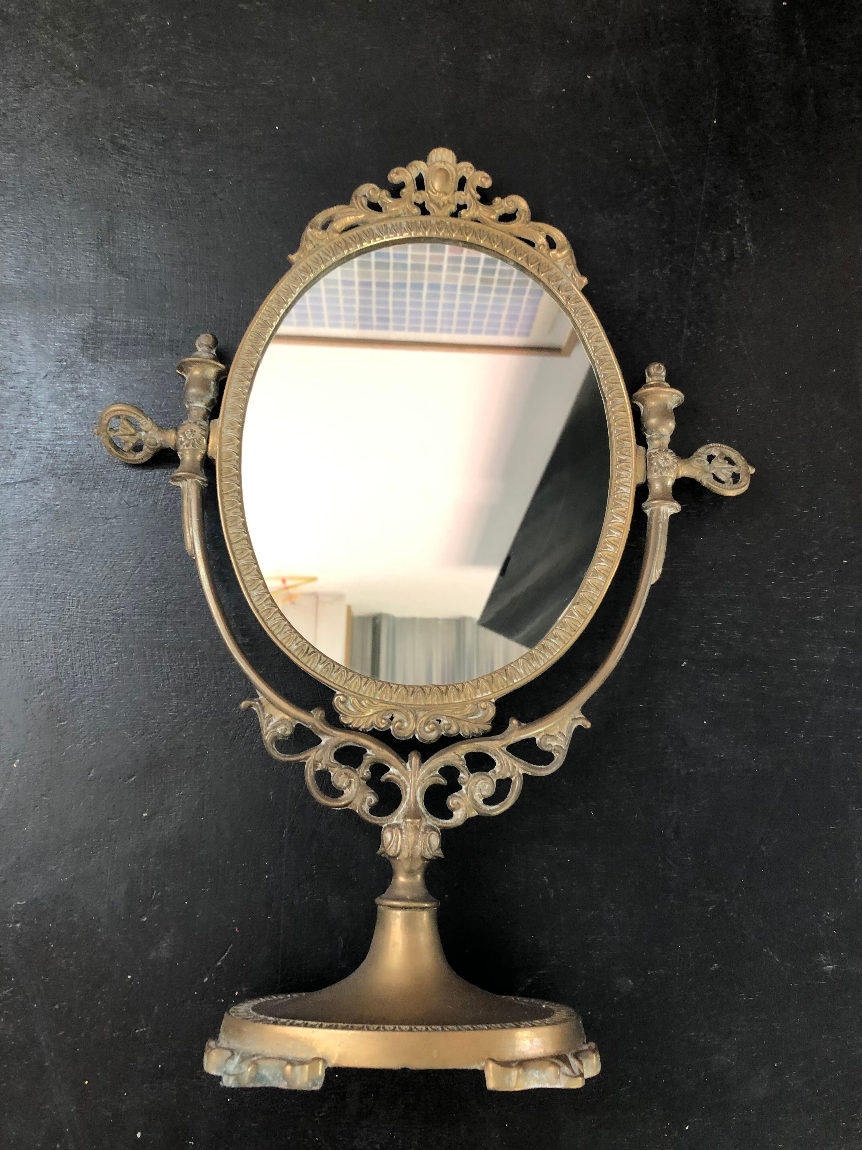 Swivel bronze mirror