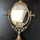 Miroir en bronze pivotant