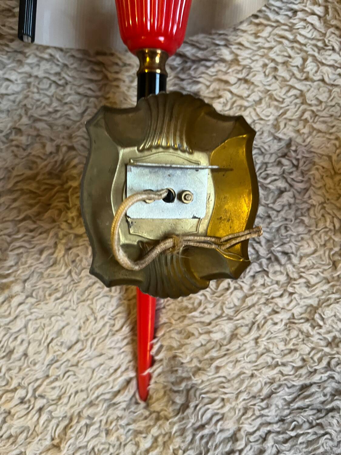 Pair of circa 70s plastic and brass wall lights