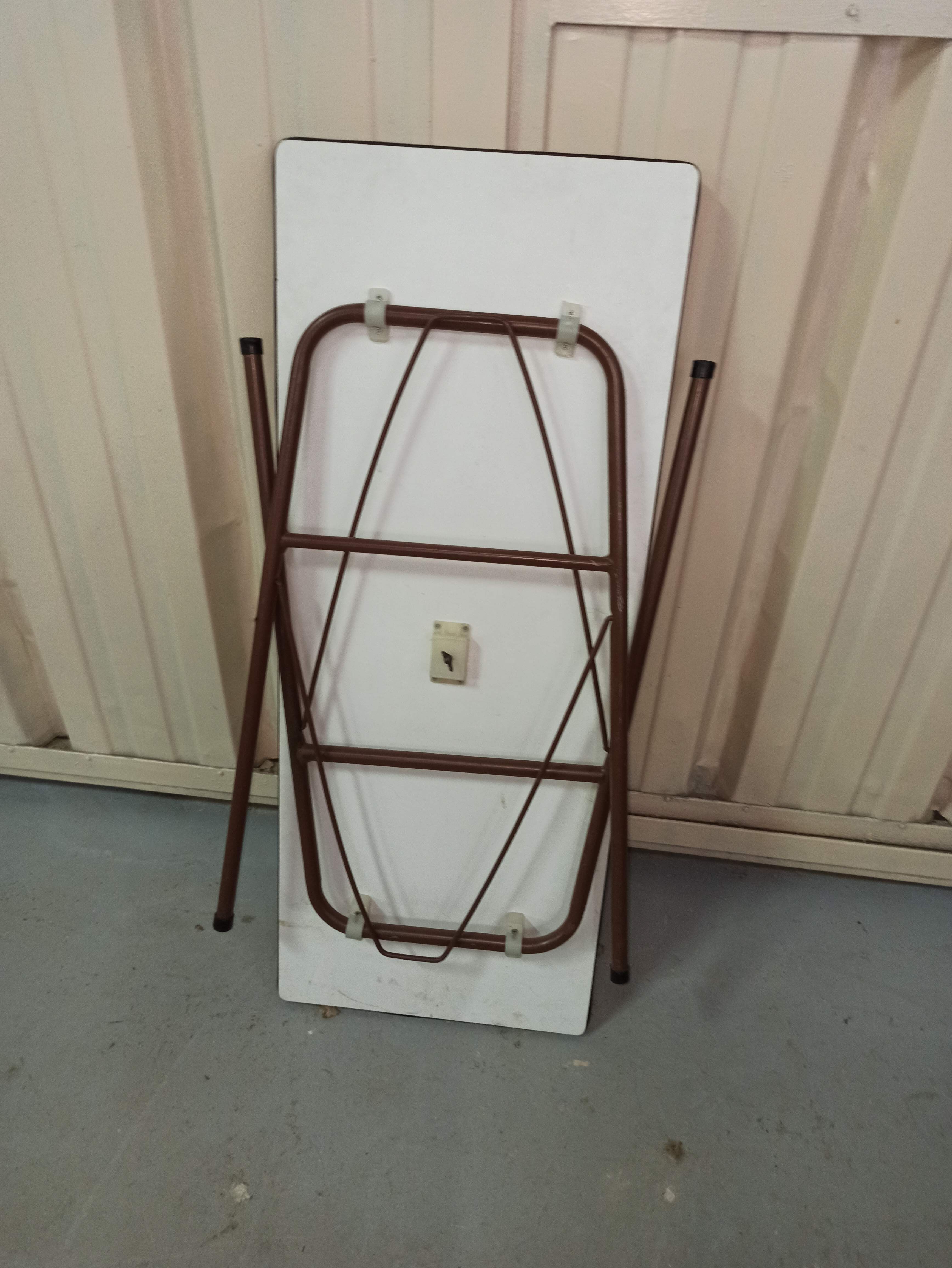 Folding table in formica brown console