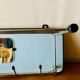 Vintage wall-mounted coat rack in wood and chrome metal with mirror